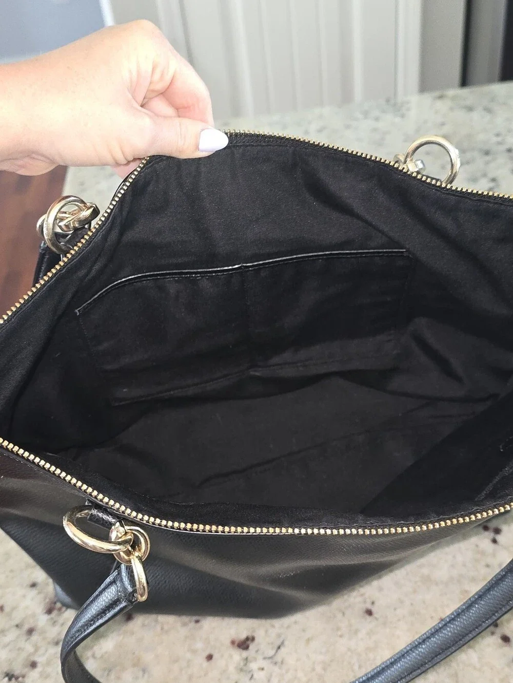 Coach Black Leather Tote with Gold Accents